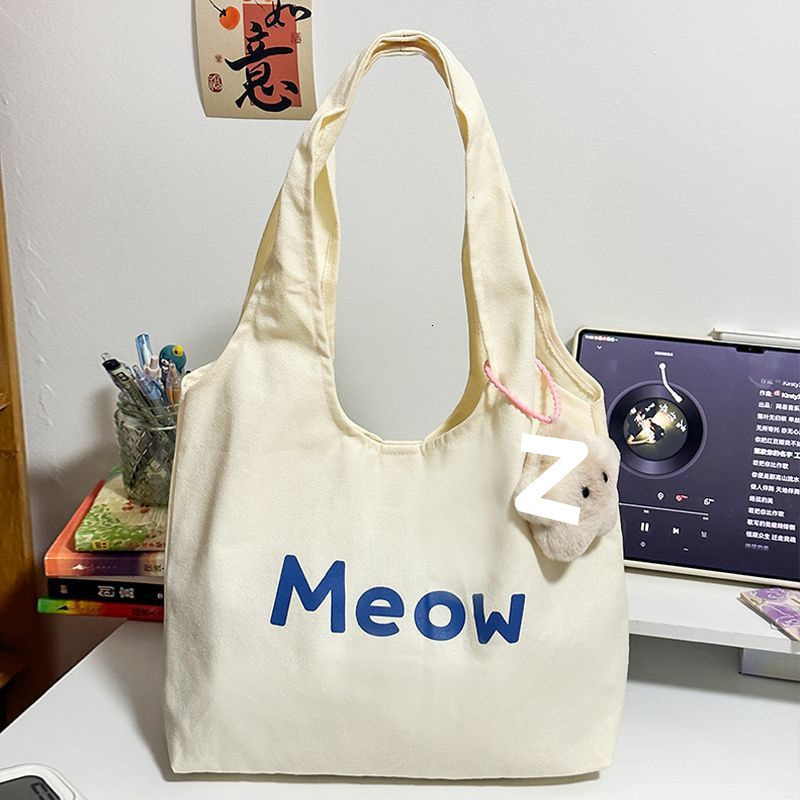 2025 Autumn New Canvas bag Bag College Student Commuting Canvas Bag White Leisure Large Capacity Handbag Designer Canvas Bag Women's Shoulder Bag