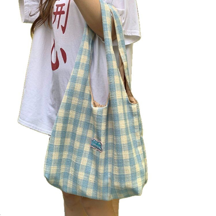 2025 autumn new casual grid simple niche lightweight female college student shoulder bag bag lightweight large capacity crossbody bag designer shoulde