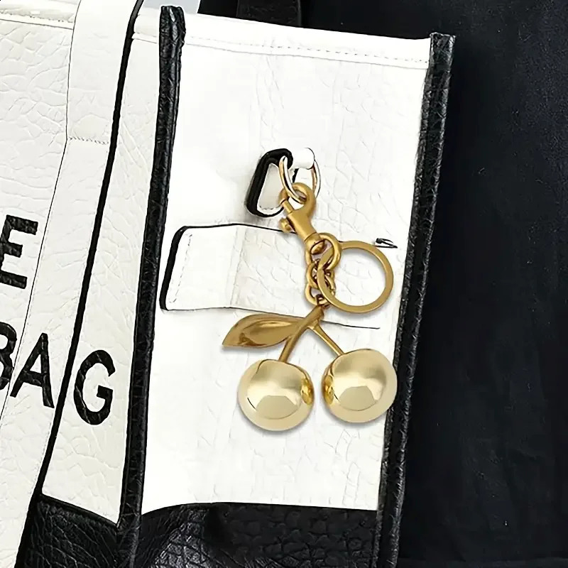 Golden Cherry Keychain Charm Shiny Resin Metal Bag Accessory Elegant Gift for Women Purse or Handbag Decoration 251015