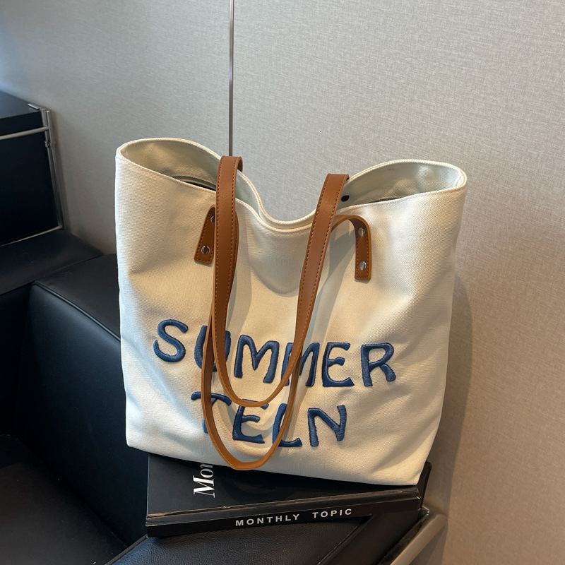 2025 Autumn New Women's Embroidered Letter Canvas Bag bag Large Capacity Commuter Handbag Single Shoulder Student Leisure Designer Single Shoulde