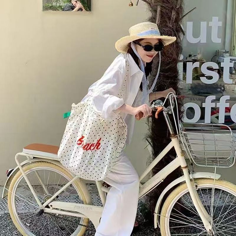 2025 autumn bag new fashionable simple niche design lightweight Korean version commuting armpit bag with letter printed handbag designer shoulder bag