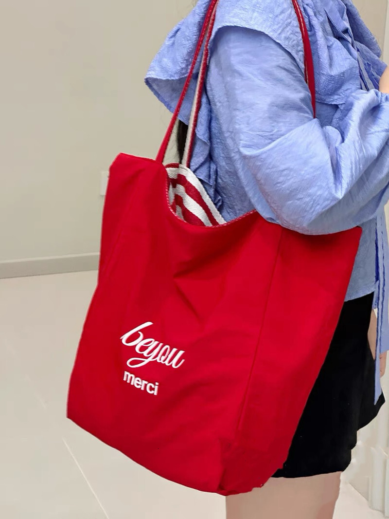 2025 autumn new striped canvas bag bag, Korean version handbag, casual, simple, niche, lightweight, large capacity, available with designer shoulder b