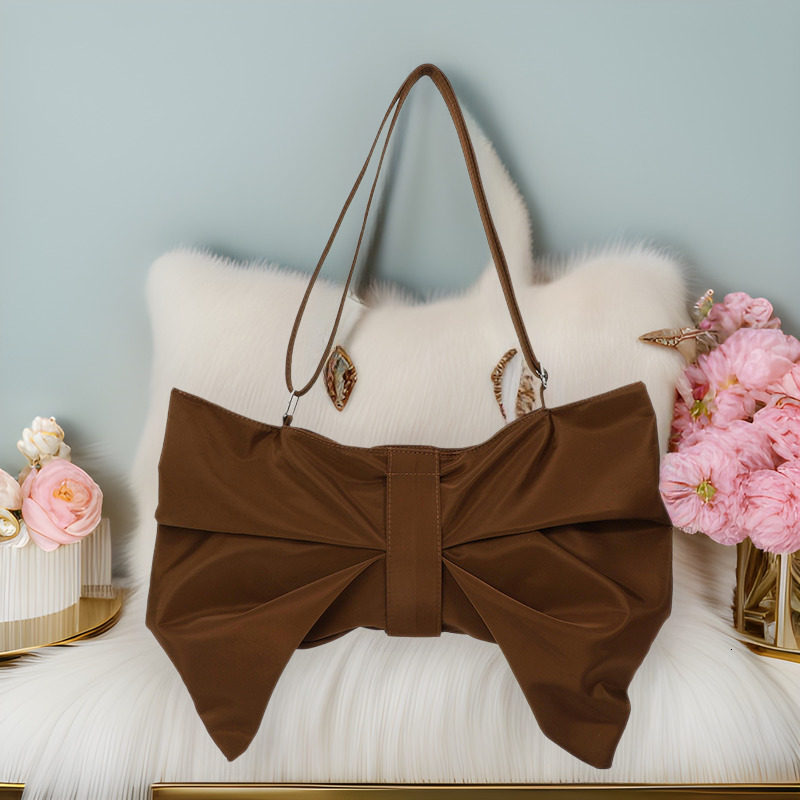 Autumn new Korean style personalized bow simple large capacity crossbody bag bag niche design women's canvas bag elegant designer shoulder bag