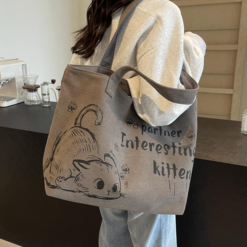 2025 Autumn New Student Commuter Single Shoulder Handbag Handbag Simple and Cute Cartoon Large Capacity Women's Single Shoulder Bag bag Designer 