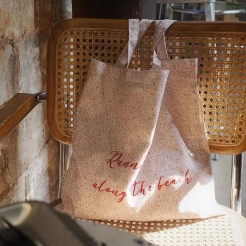 2025 bag autumn new romantic pink flower casual canvas bag, simple, niche, lightweight, college student large capacity handbag, designer canvas bag