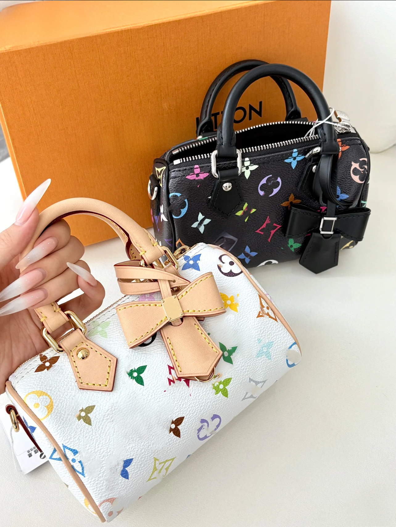 L v mini pillow bag Presbyopic material mini handbags Womens crossbody bags White Tricolor detachable and adjustable shoulder strap, coated canvas