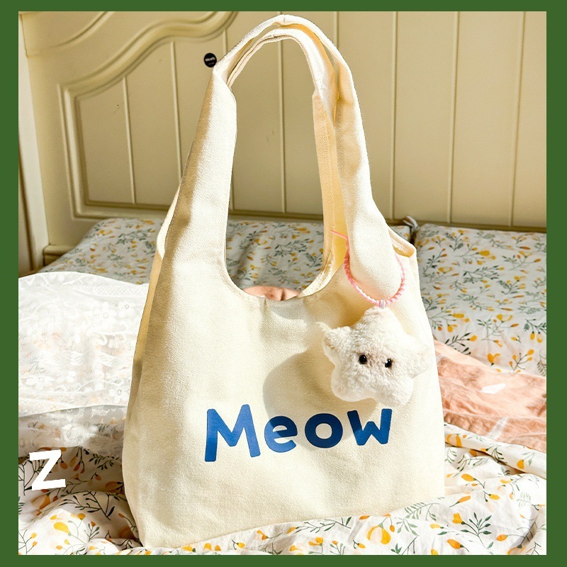 2025 Autumn New Canvas bag Bag College Student Commuting Canvas Bag White Leisure Large Capacity Handbag Designer Canvas Bag Women's Shoulder Bag