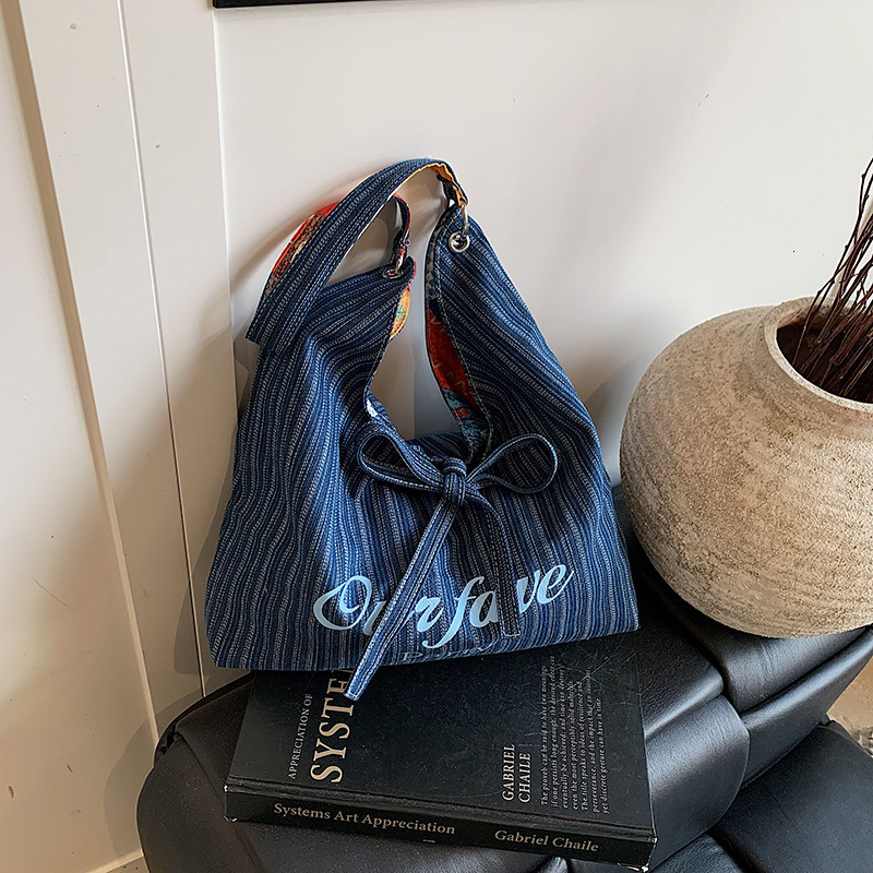 2025 autumn new Korean version niche fashion lazy bag style simple denim underarm bag double-sided usable shoulder bag designer canvas bag