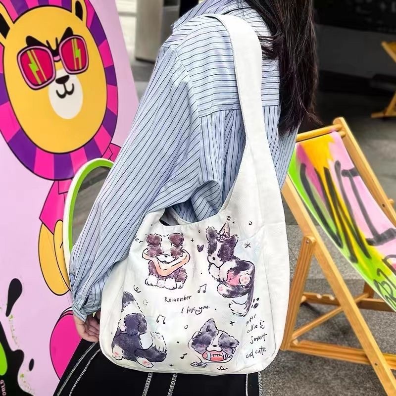 2025 autumn new small dog shoulder bag, niche minimalist style, large capacity canvas bag bag, student commuting handbag, casual outdoor designer shou
