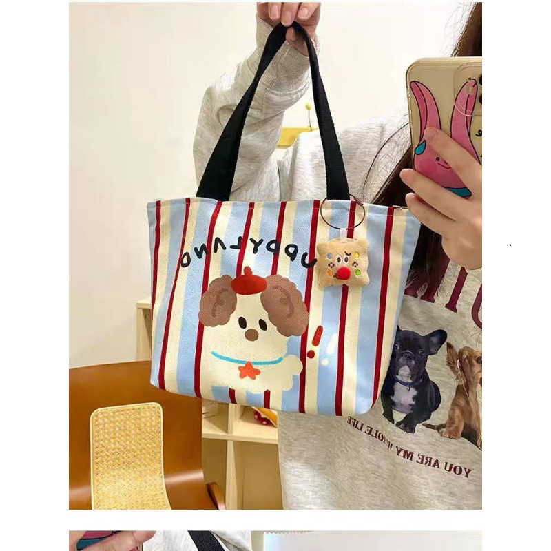 2025 autumn bag new minimalist style fashionable niche design handheld cute puppy style lightweight college canvas bag designer handbag