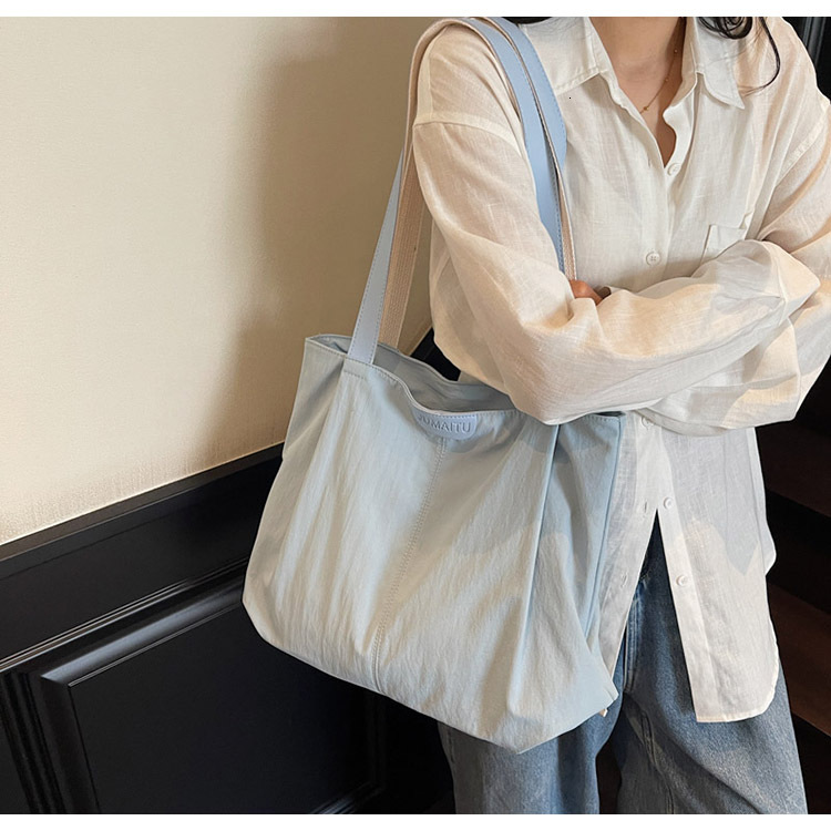 2025 Autumn New Women's Leisure Large Capacity Bag Lightweight Shoulder Bag Simple bag Canvas Handbag College Student Commuter Bag Designer Shoul