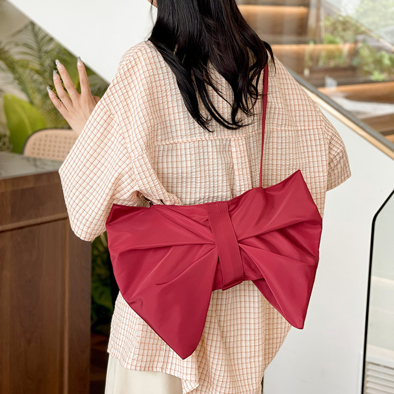 Autumn new Korean style personalized bow simple large capacity crossbody bag bag niche design women's canvas bag elegant designer shoulder bag