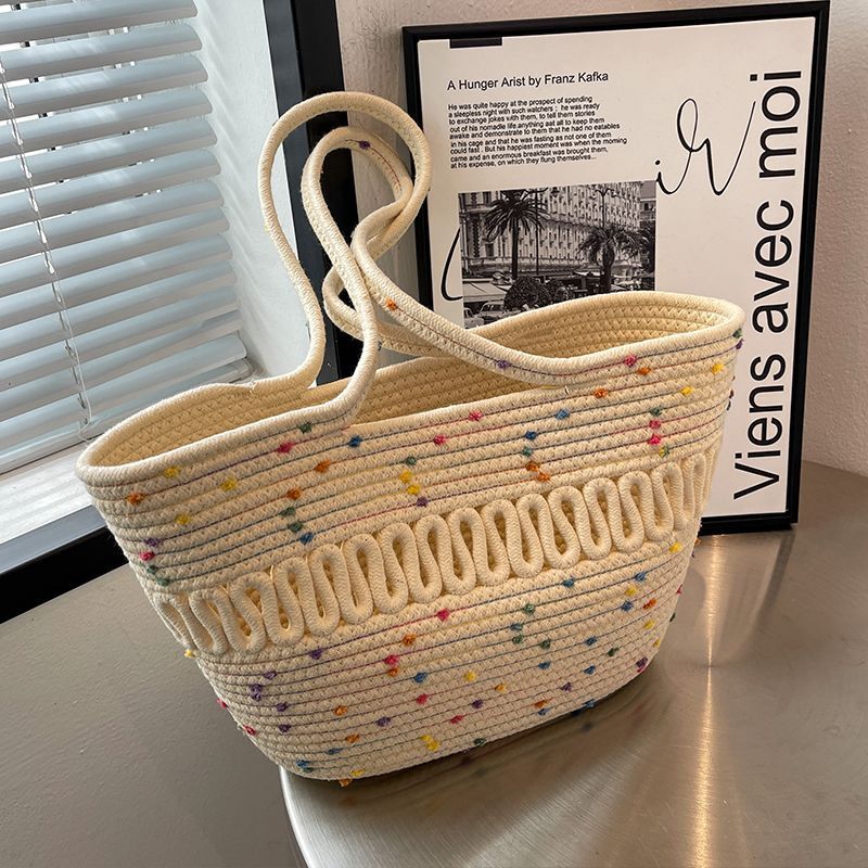 2025 autumn new minimalist niche design atmospheric hollow cotton woven bag large capacity beach vacation women's bag beach bag designer shoulder