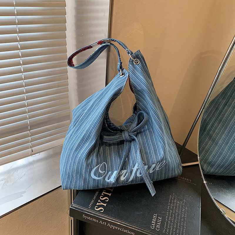 2025 autumn new Korean version niche fashion lazy bag style simple denim underarm bag double-sided usable shoulder bag designer canvas bag