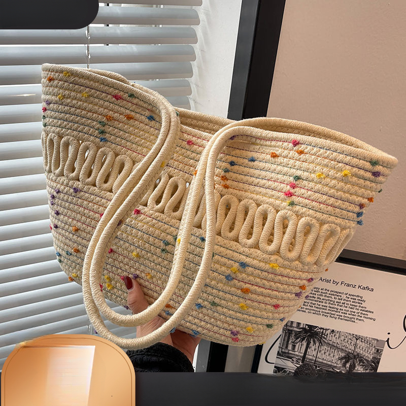 2025 autumn new minimalist niche design atmospheric hollow cotton woven bag large capacity beach vacation women's bag beach bag designer shoulder