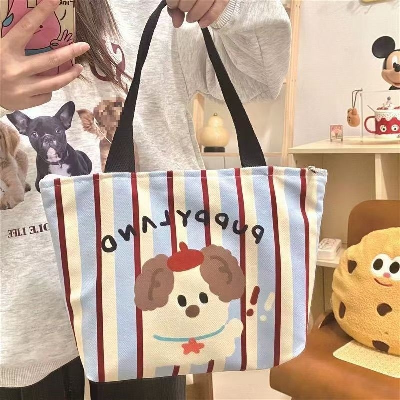 2025 autumn bag new minimalist style fashionable niche design handheld cute puppy style lightweight college canvas bag designer handbag