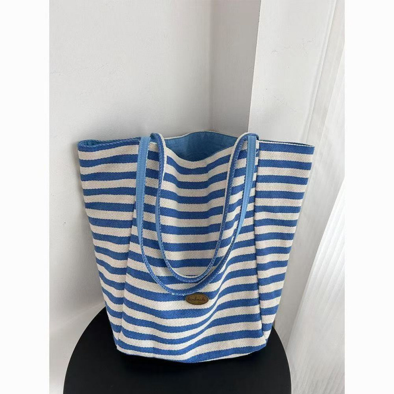 2025 autumn new double-sided striped canvas bag bag niche simple Korean style double-sided usable lazy style handbag designer shoulder bag women'