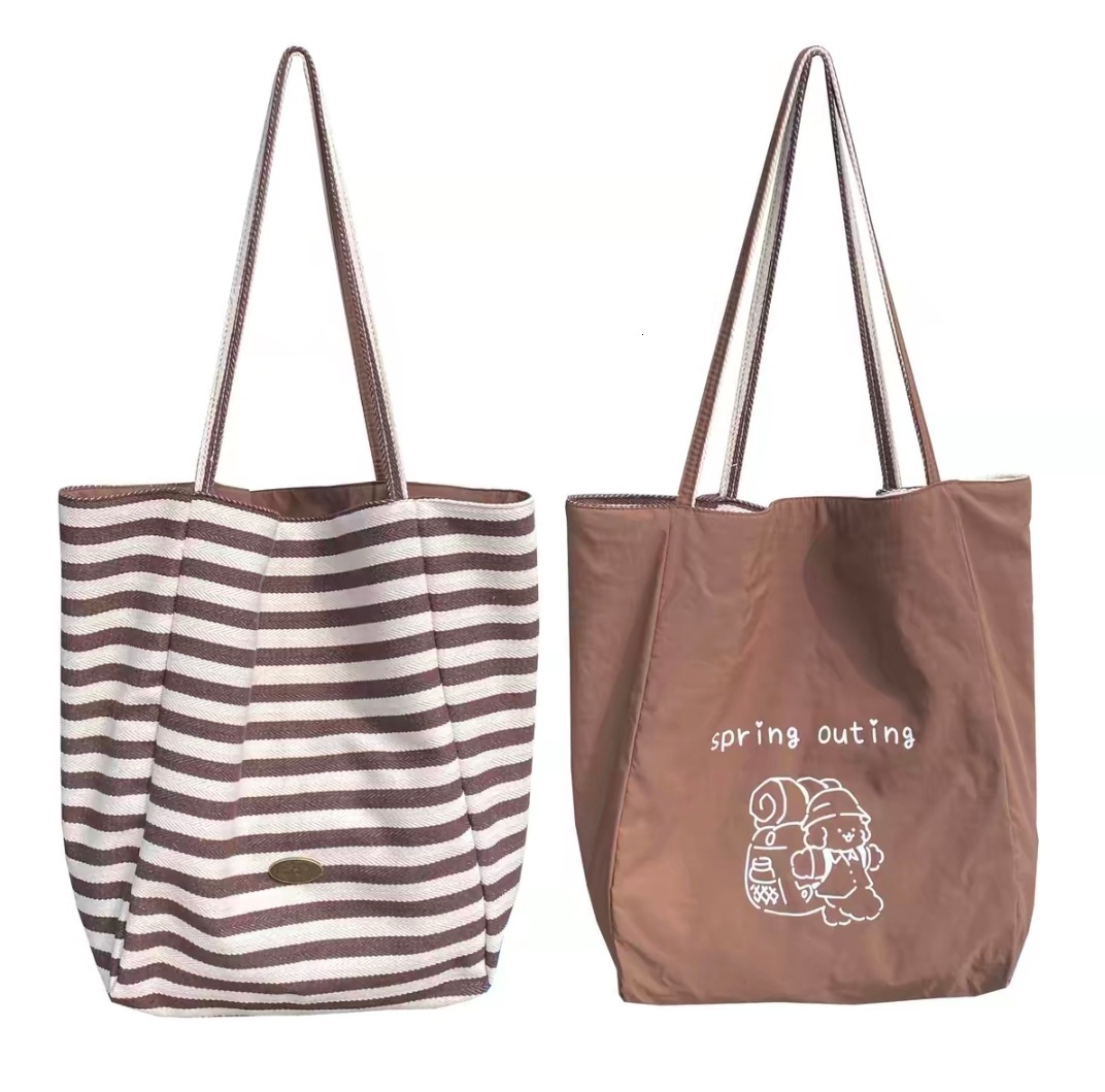 2025 autumn new casual lightweight striped double-sided usable simple niche commuting canvas handbag designer canvas bag bag women's shoulder bag