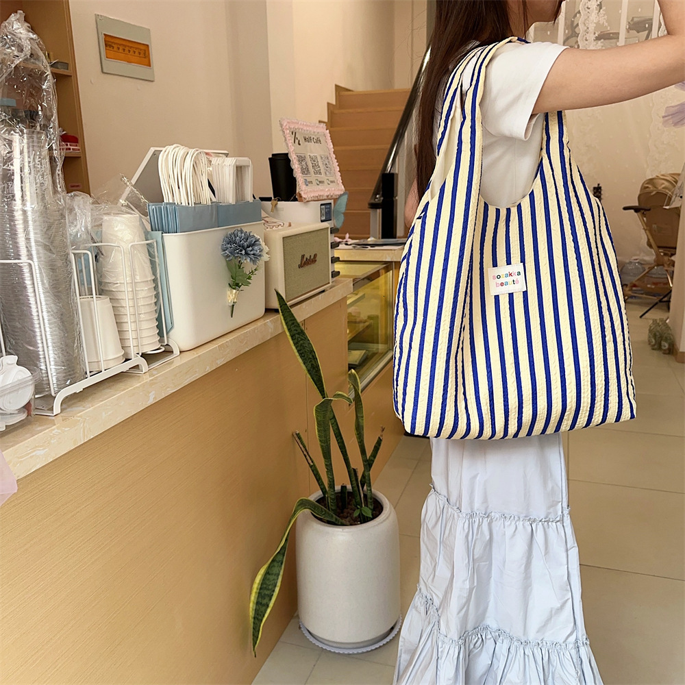 2025 Autumn New Striped Women's Canvas Handbag, Simple, Large Capacity, Lightweight, Commuter Diagonal Cross Bag, niche Designer bag Shoulder Bag