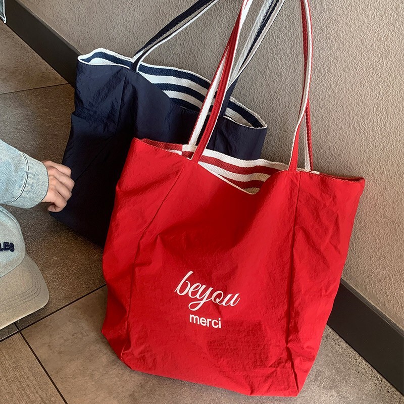 2025 autumn new casual lightweight striped double-sided usable simple niche commuting canvas handbag designer canvas bag bag women's shoulder bag