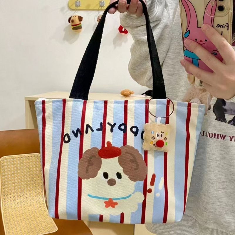 2025 autumn bag new minimalist style fashionable niche design handheld cute puppy style lightweight college canvas bag designer handbag
