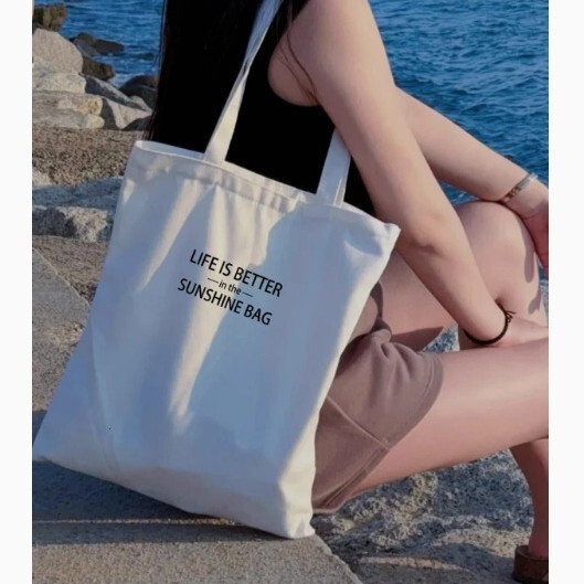 2025 autumn new minimalist letter canvas tote bag zipper shoulder bag bag casual niche designer shoulder bag women's canvas bag