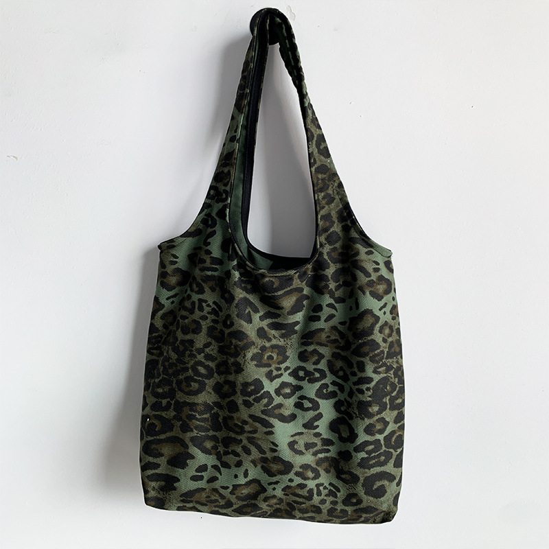 2025 autumn new leopard print simple niche women's fashion leopard print cloth bag Korean casual fashion student shoulder bag designer bag canvas