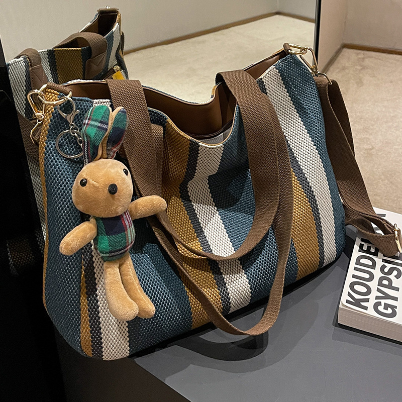 2025 autumn new women's large capacity simple niche casual college canvas bag striped handbag commuting bag crossbody bag designer shoulder bag