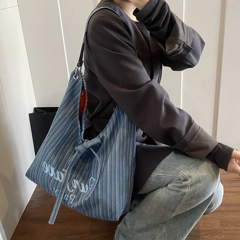 2025 autumn new Korean version niche fashion lazy bag style simple denim underarm bag double-sided usable shoulder bag designer canvas bag