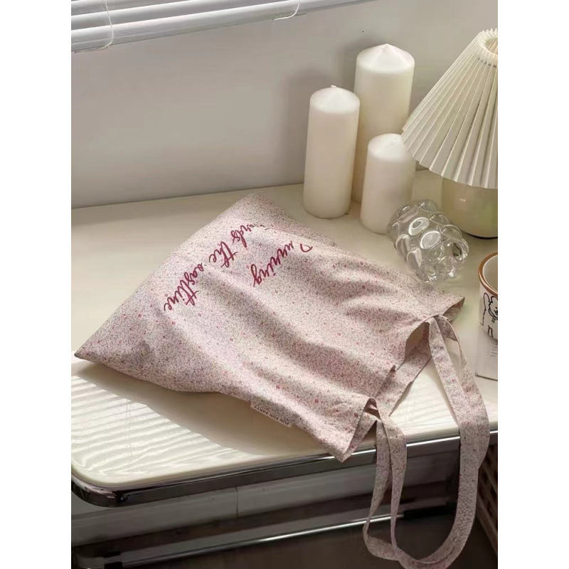 2025 bag autumn new romantic pink flower casual canvas bag, simple, niche, lightweight, college student large capacity handbag, designer canvas bag