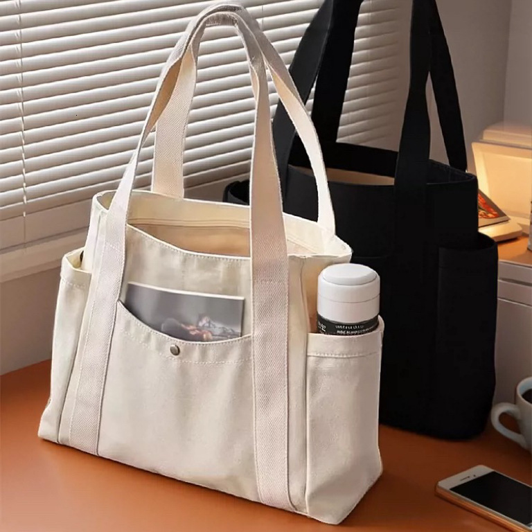 2025 autumn new large capacity canvas handbag lightweight niche design simple commuting bag designer shoulder bag women's bag canvas bag