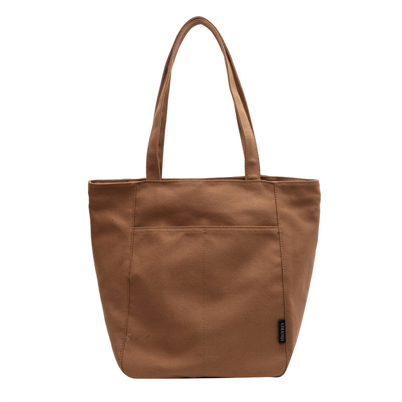 2025 autumn new women's canvas bag with large capacity, simple and bag niche design, commuting handbag, student shoulder bag, designer canvas bag