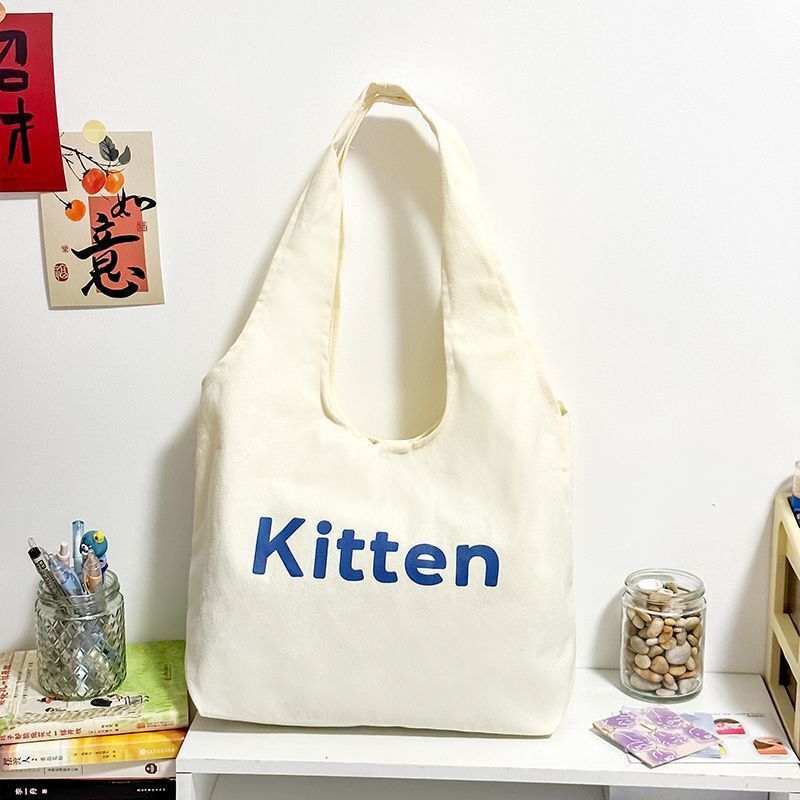 2025 Autumn New Canvas bag Bag College Student Commuting Canvas Bag White Leisure Large Capacity Handbag Designer Canvas Bag Women's Shoulder Bag