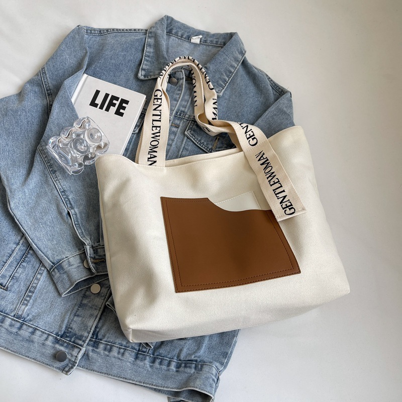 2025 bag autumn new shoulder strap print niche simple casual collage color block canvas bag gentle women's shoulder bag designer diagonal cross b