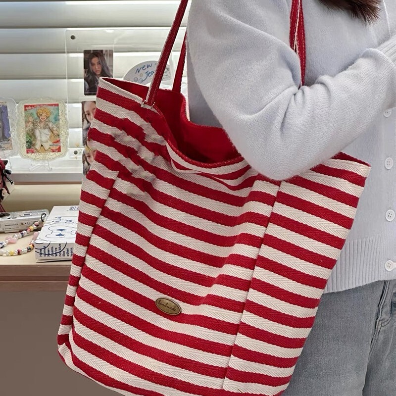 2025 autumn new striped canvas bag bag, Korean version handbag, casual, simple, niche, lightweight, large capacity, available with designer shoulder b