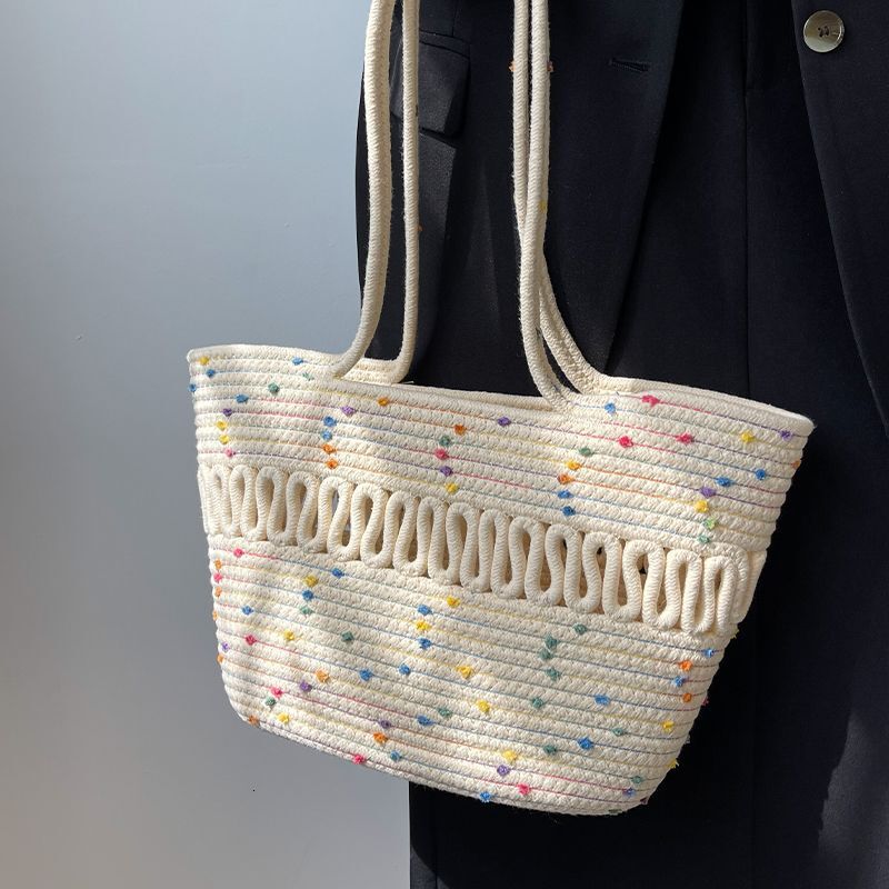 2025 autumn new minimalist niche design atmospheric hollow cotton woven bag large capacity beach vacation women's bag beach bag designer shoulder