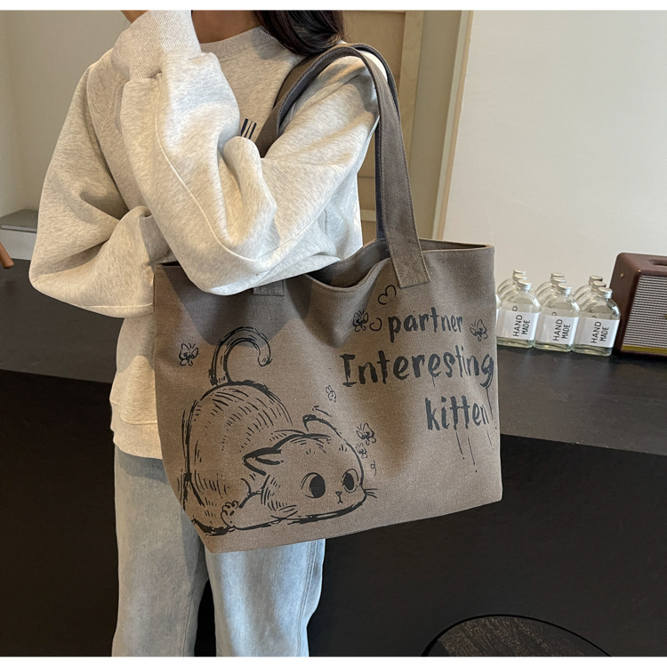 2025 Autumn New Student Commuter Single Shoulder Handbag Handbag Simple and Cute Cartoon Large Capacity Women's Single Shoulder Bag bag Designer 