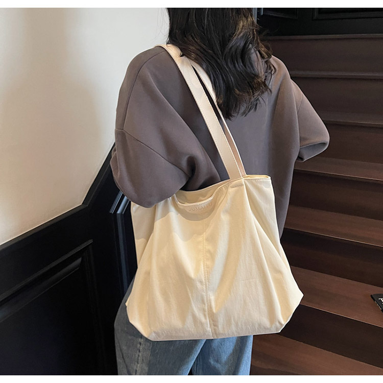 2025 Autumn New Women's Leisure Large Capacity Bag Lightweight Shoulder Bag Simple bag Canvas Handbag College Student Commuter Bag Designer Shoul