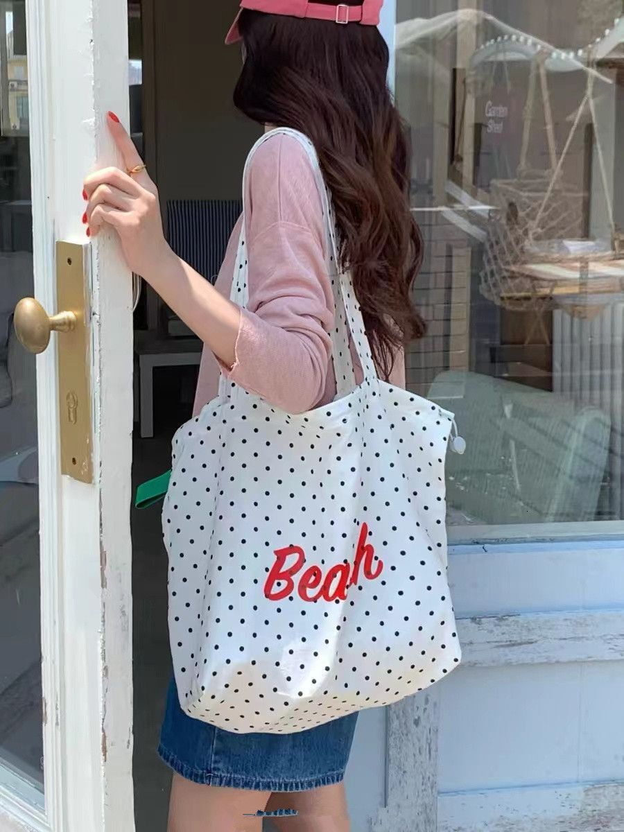 2025 autumn bag new fashionable simple niche design lightweight Korean version commuting armpit bag with letter printed handbag designer shoulder bag