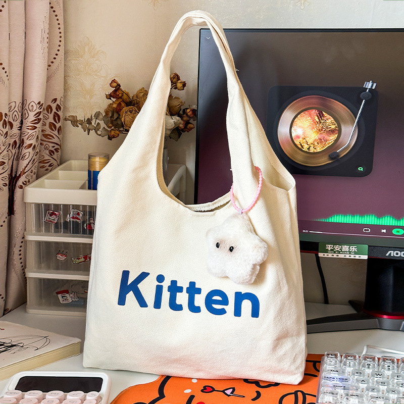 2025 Autumn New Canvas bag Bag College Student Commuting Canvas Bag White Leisure Large Capacity Handbag Designer Canvas Bag Women's Shoulder Bag