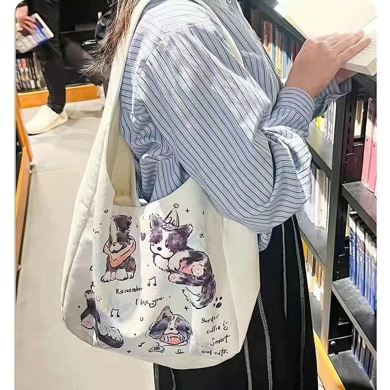 2025 autumn new small dog shoulder bag, niche minimalist style, large capacity canvas bag bag, student commuting handbag, casual outdoor designer shou