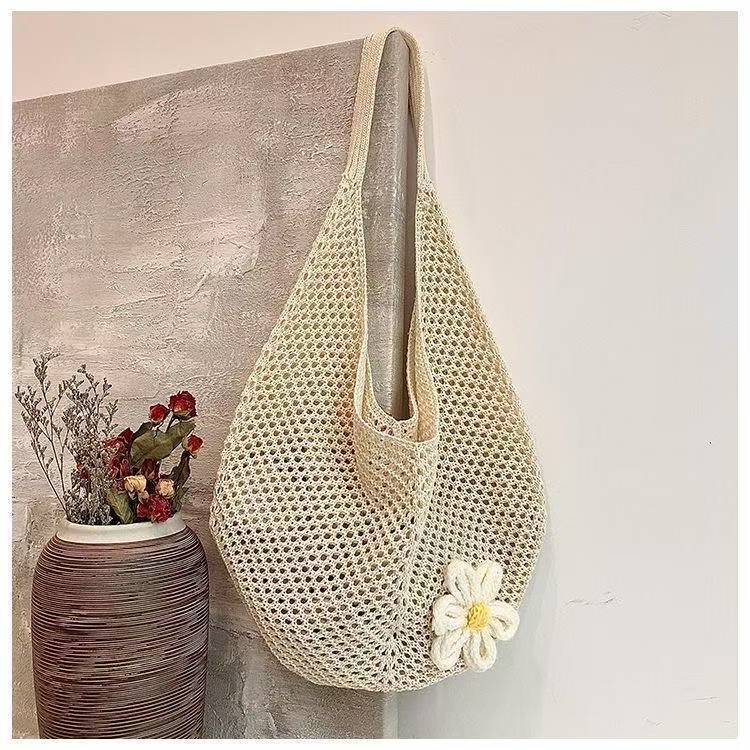 2025 Autumn New Women's Knitted Woven Bag Korean style Simple, Small and Popular bag Lazy Knitted Hollow Flower Beach Bag Designer Shoulder Bag