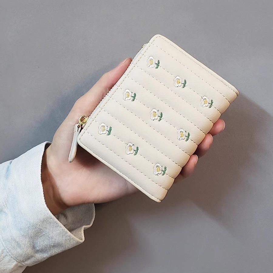 2025 autumn new cream small square Japanese style niche light luxury simple mini elegant women's short coin wallet card bag designer wallet