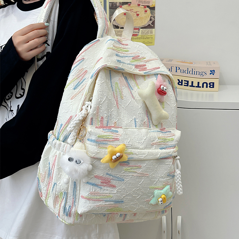 2025 autumn new lightweight and simple Japanese style versatile backpack niche style college atmosphere student design sense travel backpack designer 