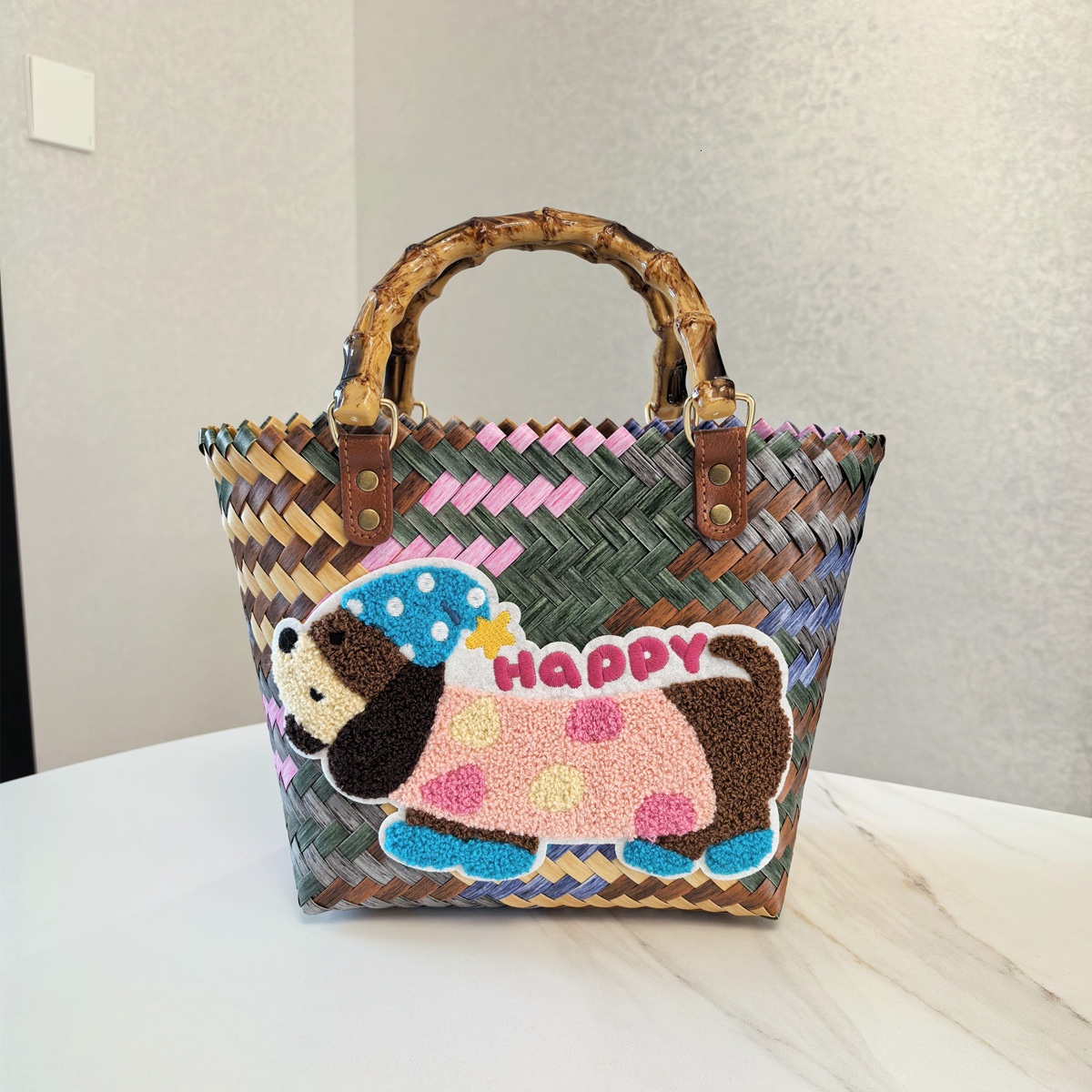 2025 autumn new retro striped sausage dog woven bag bag with simple and niche design, nylon rope pendant, women's handbag designer beach bag