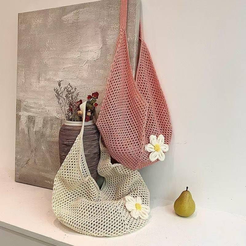 2025 Autumn New Women's Knitted Woven Bag Korean style Simple, Small and Popular bag Lazy Knitted Hollow Flower Beach Bag Designer Shoulder Bag