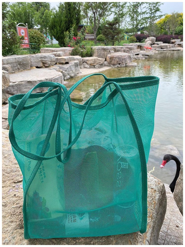 2025 autumn new niche style transparent mesh simple shoulder bag fashionable, lightweight, large bag capacity beach bag designer canvas bag