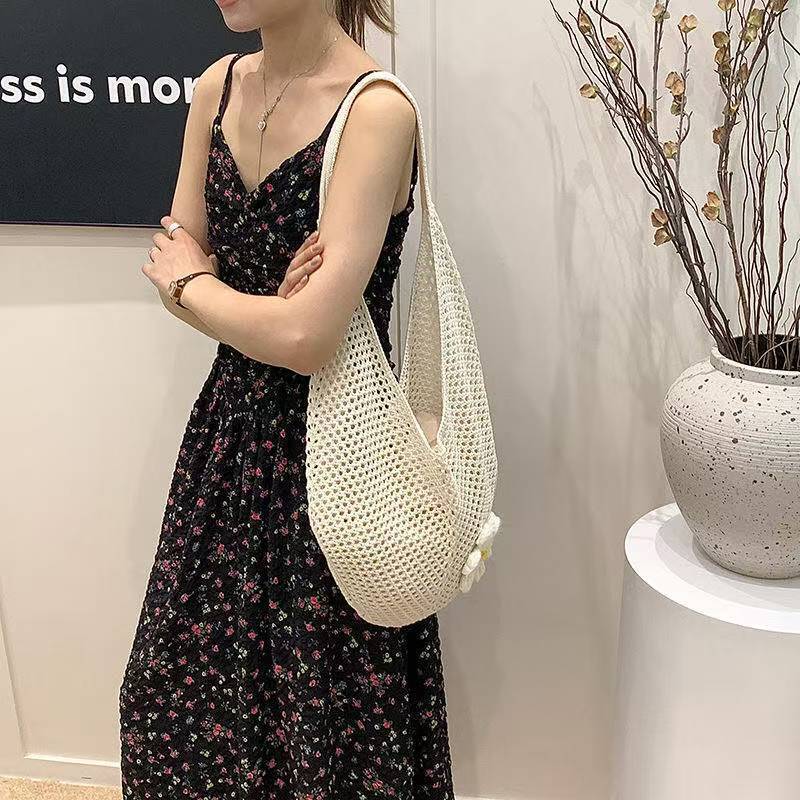 2025 Autumn New Women's Knitted Woven Bag Korean style Simple, Small and Popular bag Lazy Knitted Hollow Flower Beach Bag Designer Shoulder Bag