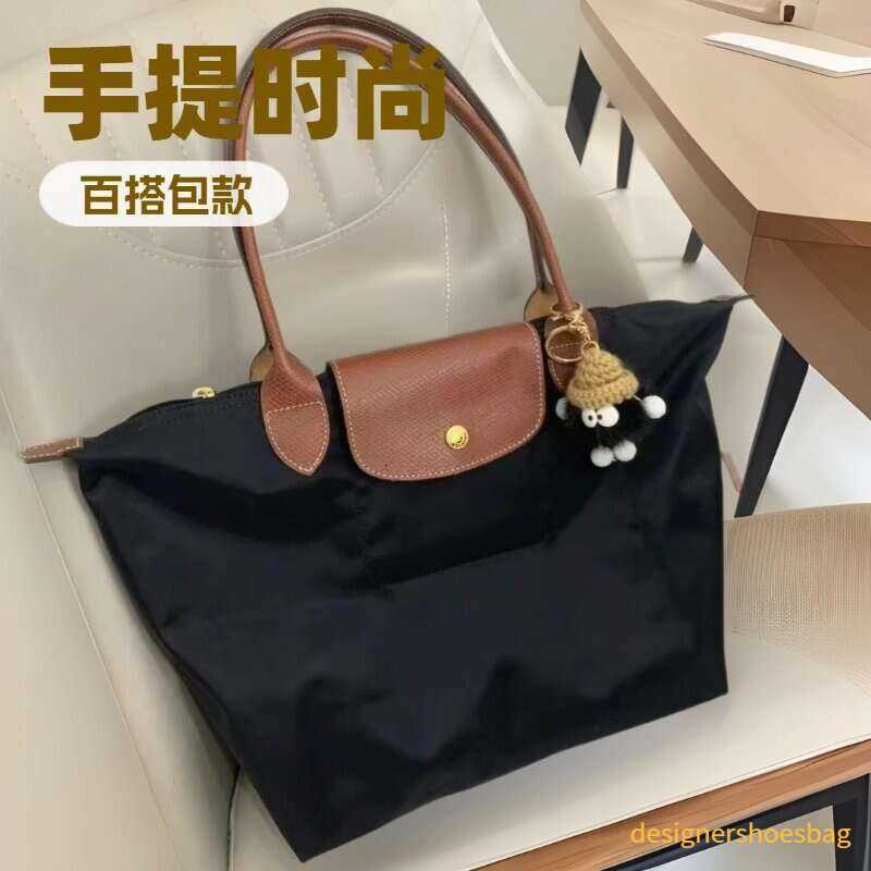 Shoulder Bags French designer Long Handle Large Classic Womens Handbag Fashion Versatile Tote Embroidered Dumpling Bag designer casual luxury bag