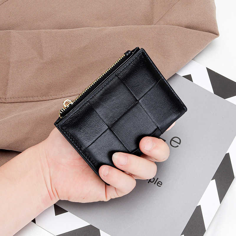 2025 autumn new women's atmospheric elegant short Korean version niche design light luxury woven mini leather foldable small wallet designer wall
